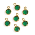 Detail of round green faceted glass charms with gold-plated copper edges and hanging loops - Copper-Dark Green