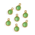 Detailed view of seven round green glass charms with gold-plated metal frames - Copper-Light Green