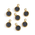 Macro view of seven pieces round gold-plated copper glass pendants for DIY jewelry - Copper-Black