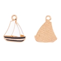 Macro detail of alloy sailboat charm with white enamel front and textured gold metal back - Black Sailboat (A5-386)