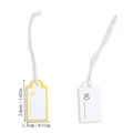 Close-up of small white paper jewelry price tags with cotton string, 2.6cm x 1.3cm - Numbered White Tag with Elastic String (A5-441)
