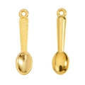 Close-up of golden miniature metal spoon charms with hanging holes for DIY jewelry making - Spoon / Gold