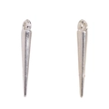 Close-up of polished silver cone pendants with rings for DIY punk jewelry making - 22mm / Silver