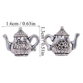 Detailed view of antique silver teapot charms featuring tea time engraving and floral relief - A3-141-antique Silver/16*13mm/2.37g