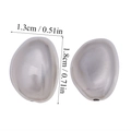 Macro view of silver liquid metal style pebble earrings with size 1.3cm by 1.8cm - Large Pebble Bead (A6-102) / 50 Pieces / Silver
