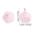 Detalle macro de colgantes de ajo en resina rosa de 2cm con medidas para joyería DIY - A6-071-dientes De Ajo/20*16 Mm/238 G