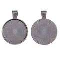 Detail view of round 25mm pendant trays with geometric patterns in antique silver finish - 35x27mm / Gunmetal