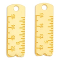 Detailed view of two gold alloy ruler pendants with precise engraved scale markings - Gold