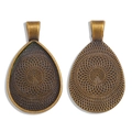 Macro view of bronze water drop alloy pendant tray with geometric patterns for DIY jewelry - 35*21mm (Inner 18*25mm) / Antique Bronze