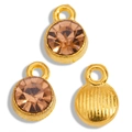 Macro shot of gold alloy pendants with champagne rhinestones for DIY jewelry making - Gold Base Champagne