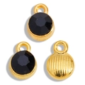 Macro detail of black faceted birthstone pendant with golden textured backing for DIY jewelry - Black With Gold Base