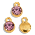 Macro detail of purple rhinestone pendants with golden base and striped back textures - Gold-Pink