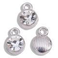 Detailed macro view of crystal rhinestones on silver alloy round birthstone pendants - Antique Silver Base Clear White