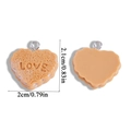 Macro view of heart-shaped biscuit pendant with LOVE embossing and silver hook detail - Heart Style (A6-374)