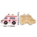 Ciondolo ambulanza in smalto rosa con bordo dorato e dimensioni 3cm x 2,2cm - Ciondolo Ambulanza - Rosa (A7-375)