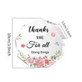 Detail view of 10cm acrylic gift plaque with floral art and thank you message - 10x10x1cm