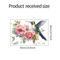Détail du sticker mural avec colibri et fleurs roses montrant les dimensions 60x40cm - 40x60cm