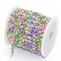 Colorful faux pearl bead chain with silver links on a white plastic spool for DIY jewelry - 4mm Beads / Mixed Colored Beads - White K Chain