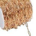 Close-up of gold paperclip chain link on white spool for jewelry making accessories - Length Width-12*4mm / KC Gold