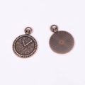Detail view of retro bronze clock charms with roman numerals and sunburst pattern - Antique Red Copper Color / 29*21mm / 3.1g