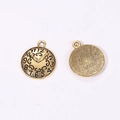 Detail view of double-sided 21mm vintage bronze clock pendant for DIY steampunk jewelry - Antique Gold Finish / 21 X 18 Mm / 1.44 G