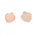Detail of heart-shaped DIY resin charms showing glitter front and sunburst metal back - A4-485-heart-white/16*14mm/1.14g