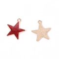 Detailed macro view of two alloy star pendants with red glitter oil and sunray texture - A4-486-pentagram-red/18*16mm/0.74g