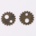 Close-up of 12mm bronze alloy steampunk gear pendants for DIY jewelry crafting accessories - Antique Bronze Color / 12*12mm / 0.55g