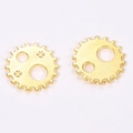 Macro detail of 12mm golden steampunk gear charms for DIY craft making and jewelry - Imitation Gold Color / 12*12mm / 0.55g