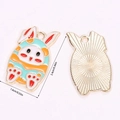 Detailed front and back view of cartoon bunny egg charm with dimensions 1.4cm by 2.4cm - A5-070