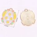 Detailed view of enamel Easter egg pendant with stars, carrots and flower patterns - A5-069