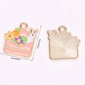 Detailed front and back view of pink enamel Easter bunny and envelope alloy pendant - A5-067