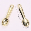 Macro view of miniature golden spoon charms with precise dimensions and ring loops - Plated Spoon (A5-085)
