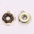 Detail view of 3D miniature chocolate donut pendant showing front and back textures - Donut Brown (A5-077)