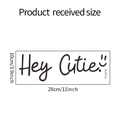 Specifiche dimensionali per l'adesivo da parete 'Hey Cutie' di 28x10 cm con faccina - 10*28cm/fx-a378