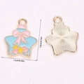 Lichtblauwe emaille zeester hanger met roze strik en gouden achterkant voor DIY sieraden - Blauwe Boogster (A5-116)