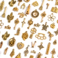 Vintage gold zinc alloy charms assortment for DIY jewelry making with mixed motifs - Antique Gold