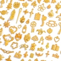 Assorted gold zinc alloy DIY jewelry pendants featuring animals and vintage tools - Imitation Gold