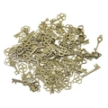 Detailed view of vintage bronze alloy skeleton keys in various DIY pendant styles - Antique Bronze