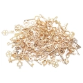Close-up of assorted gold vintage alloy key charms with love engravings for DIY jewelry - 50g Pack / KC Gold