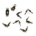 Macro shot of bronze metal bead tips for DIY jewelry making and necklace finishing - Antique Bronze Color [200 Pieces/pack]