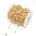Golden beaded glasses and mask chain with metallic beads on a white plastic spool - KC Gold Ball Chain