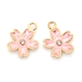 Detail of pink cherry blossom pendants with gold edges and small inset rhinestones - Pink
