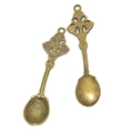Vintage bronze alloy spoon pendant with floral relief and hanging ring on white background - Antique Bronze