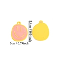 Pink and yellow smiley face alloy pendant with size dimensions of 2.4cm by 2cm - Large Painted Pink Smiley