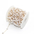 DIY gold metal chain with white teardrop pearls wound on a white spool for jewelry making - Gold Tone (A3-413)