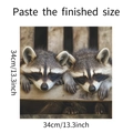 Detailed 34cm square diamond painting showing two cute sleeping raccoons on white background - 34x34cm