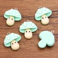 Five mint green resin mushroom charms with cute faces and silver loops for DIY jewelry - Blue