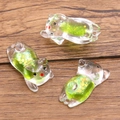 Green luminous resin pig charm with glitter liquid filling for DIY jewelry making - Green