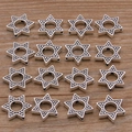 Macro shot of 16 antique silver hexagram spacer beads with textured finish for DIY jewelry - Hexagram Style (28I4-7) / Antique Silver